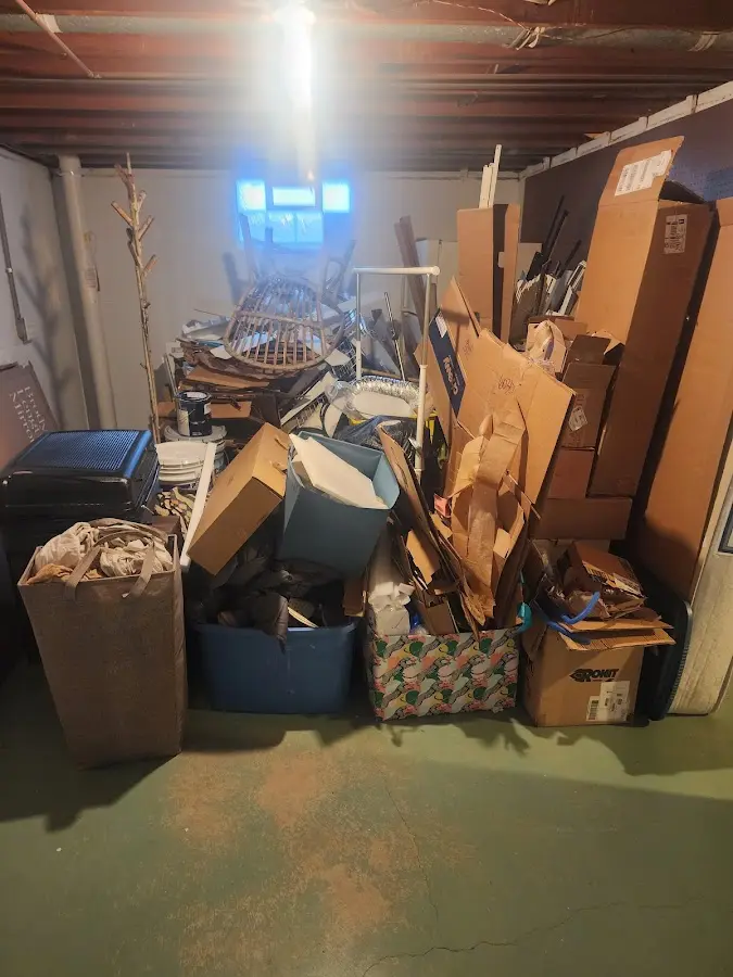 Roll-off dumpster container at job site for Cleanout Dumpster Rental in Sunnyside